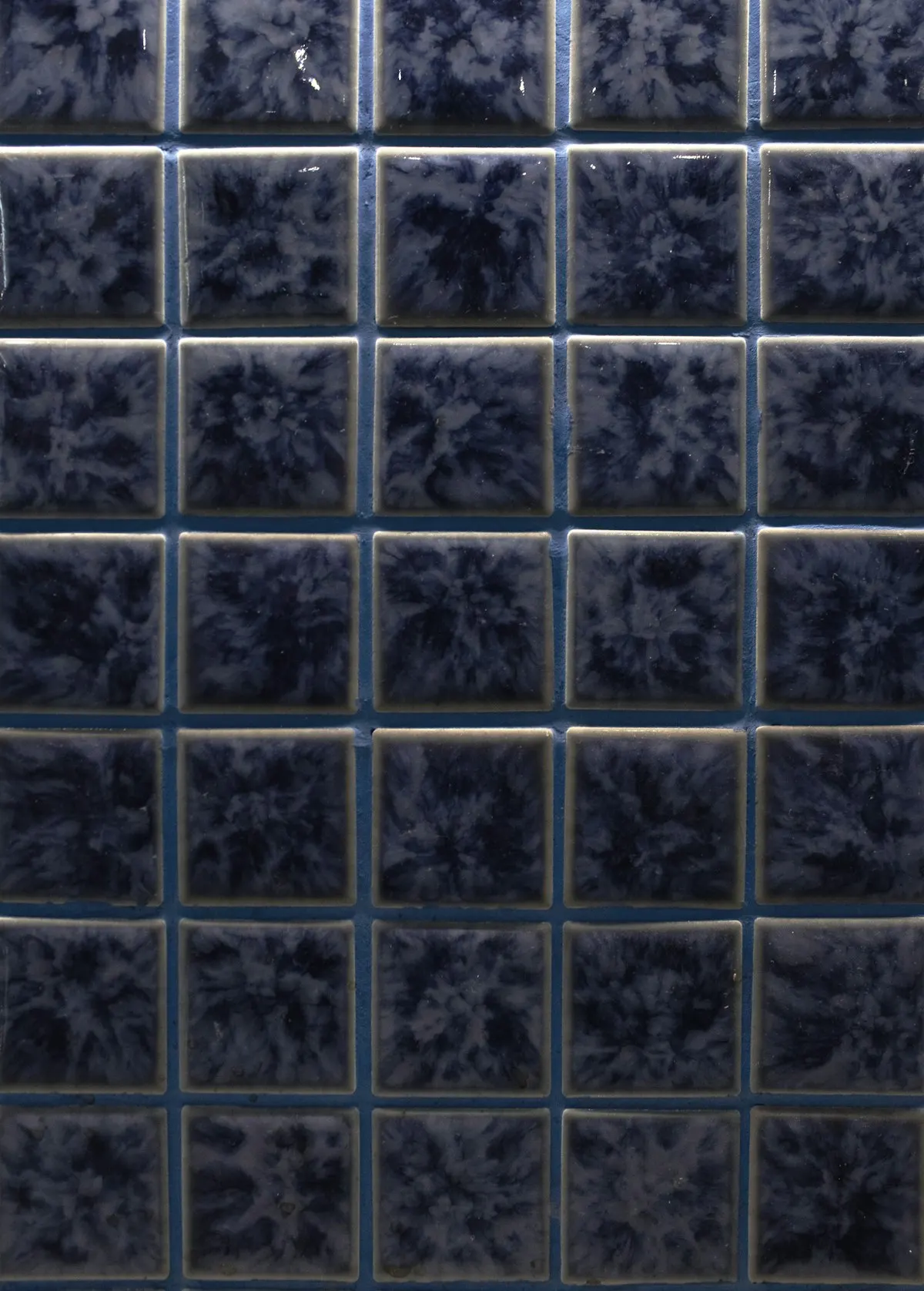 Deep blue glazed square tiles
