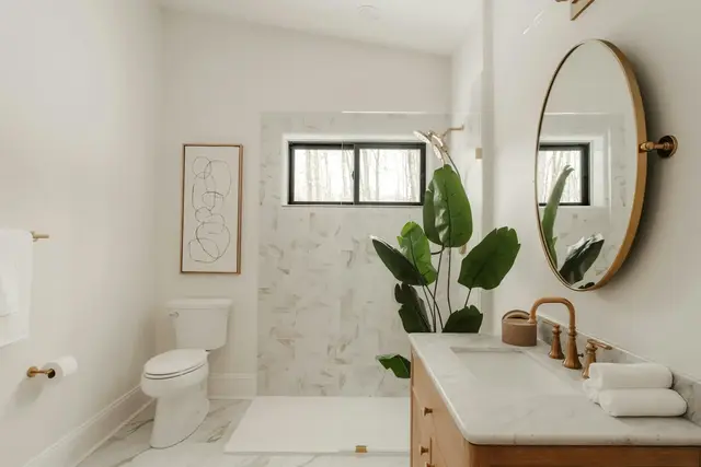 Bathroom with marble-look shower walls